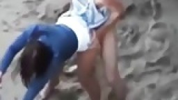 Teen brunette fucked in doggystyle on the beach